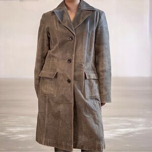 Distressed 100% leather trench coat.